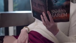 Dee is reading a romance novel