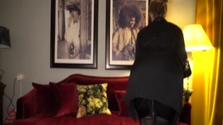 intense business meeting with female boss on velvet sofa in a hotel room - businesswhore