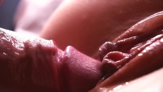slow motion. extremely close-up. sperm dripping down the pussy