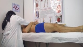 The big guy jumped on the bed and began to bang his head against the nurse's legs