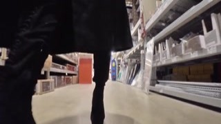 AmWednesday - long jacket in a store flashing