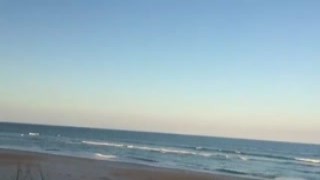 She was thirsty and couldn't resist the idea of a little blowjob on the beach