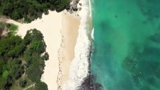 Lovely Asian girl Putri Cinta gets laid on a beach